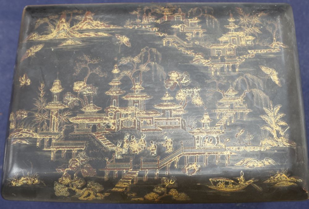 A 19th century Chinese lacquer sewing box, with ivory sewing items